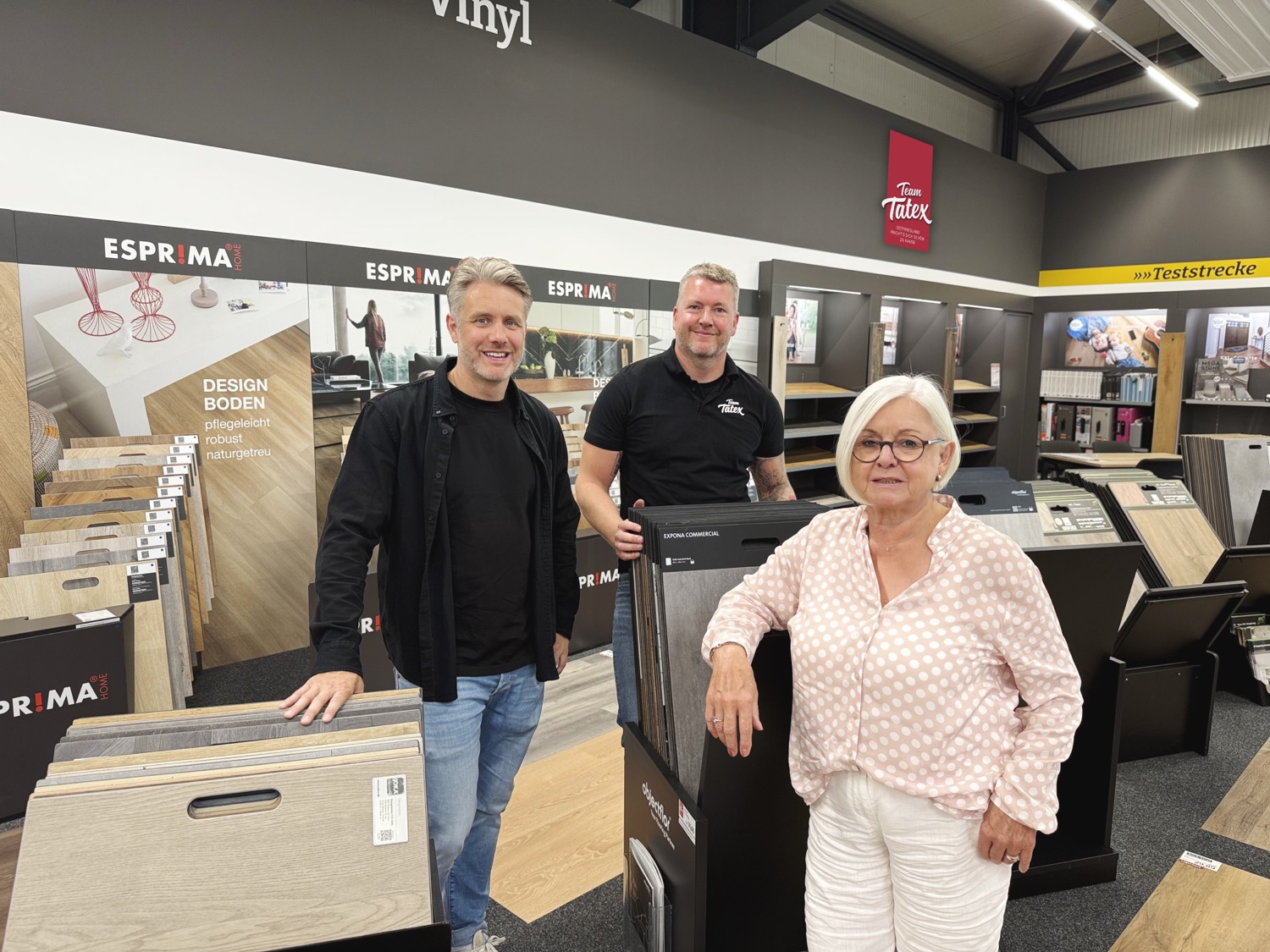 Die Inhaber Martin, Bernd und Gisela Fleßner in der Tatex-Ausstellung